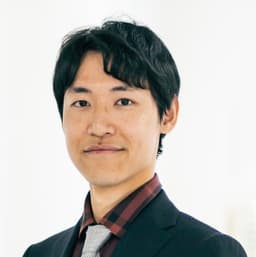 東村理功